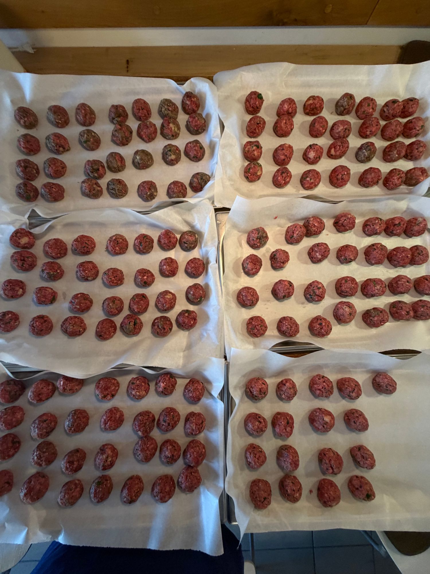 Trays of hand-rolled meatballs